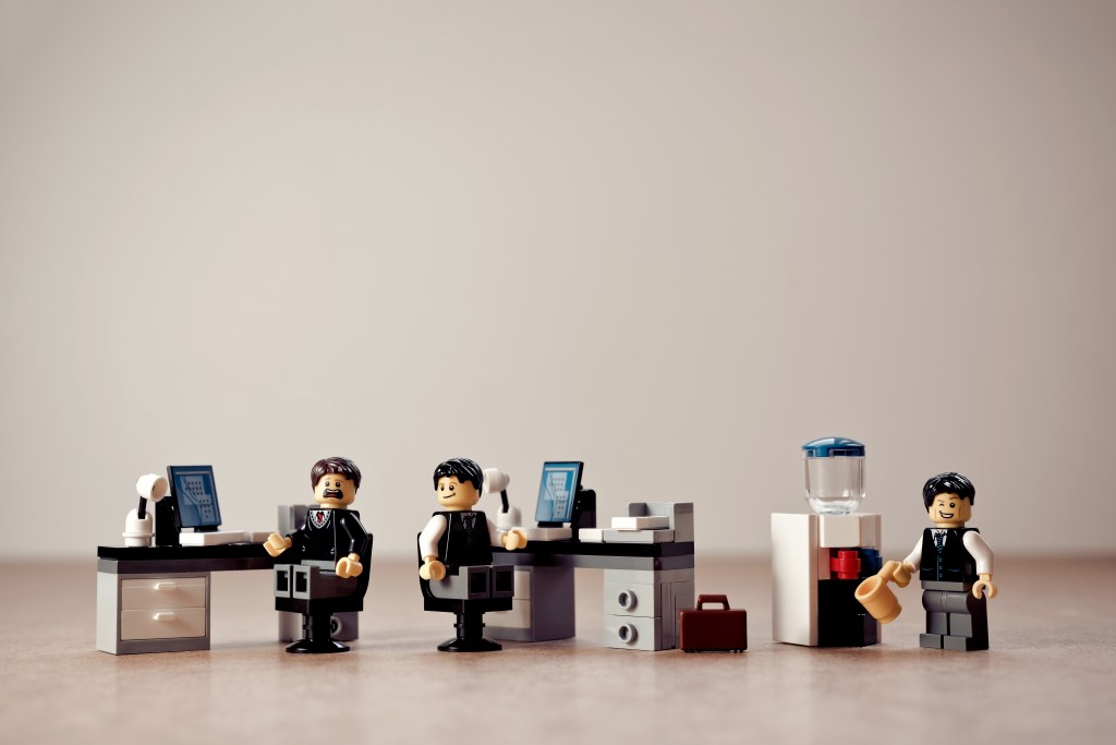 Lego people in a lego office.