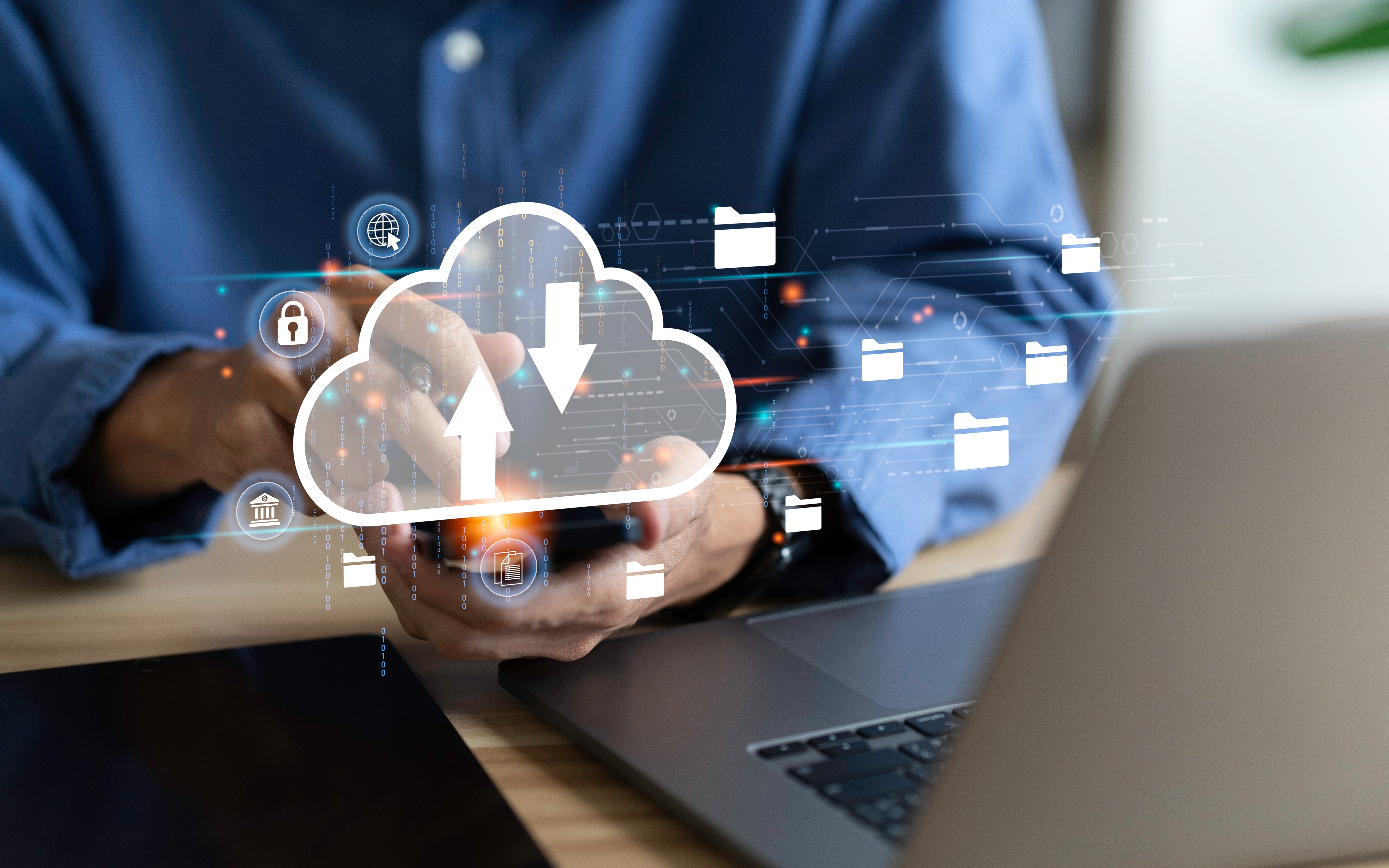 Man backing up computer.